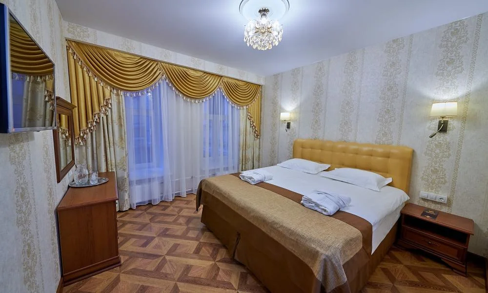 Комната улучшенная в отеле Реверанс